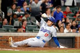 Player sliding into base